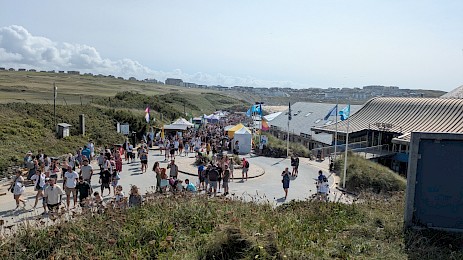Shops and stalls in the Fistral Beach car park.